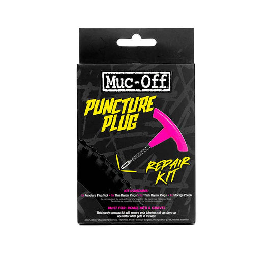 Muc-Off puncture plug repair kit packaging – Front view of a black cardboard retail box featuring yellow and pink graphics with a depicted pink T-handle puncture repair tool on a white background.