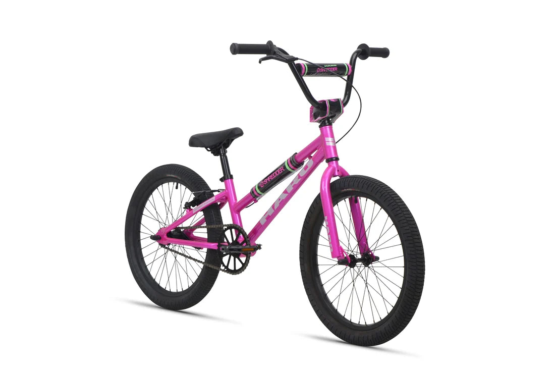 Pink Haro Shredder 20 ST kids bike – A bright magenta-pink step-through kids BMX bike features black wheels, riser handlebars with protective pads, and a padded saddle, shown against a plain white background.