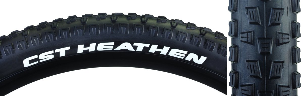 CST Heathen black mountain bike tire – A close-up view of a black CST Heathen bike tire showcasing the white printed sidewall lettering beside a vertical detail of its knobby rubber tread pattern against white.