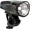 NiteRider Lumina Max headlight with handlebar mount – This black bicycle headlight features integrated cooling fins, a bright circular LED lens, and an attached black handlebar clamp against a plain white background.