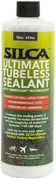 Silca Ultimate tubeless sealant 16oz bottle – A 16-ounce white plastic bottle of Silca Ultimate Tubeless Sealant with a black cap, featuring a bright green, black, and red printed label on a white background.