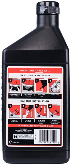 Stan's NoTubes sealant 500ml back label – Rear view of a black plastic Stan's NoTubes sealant bottle showing illustrated application instructions and a barcode against a plain white background.