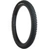 Surly Dirt Wizard 27.5 bike tire – A knobby black mountain bike tire stands upright at a three-quarter angle against a white backdrop, showing aggressive tread blocks and white sidewall branding.