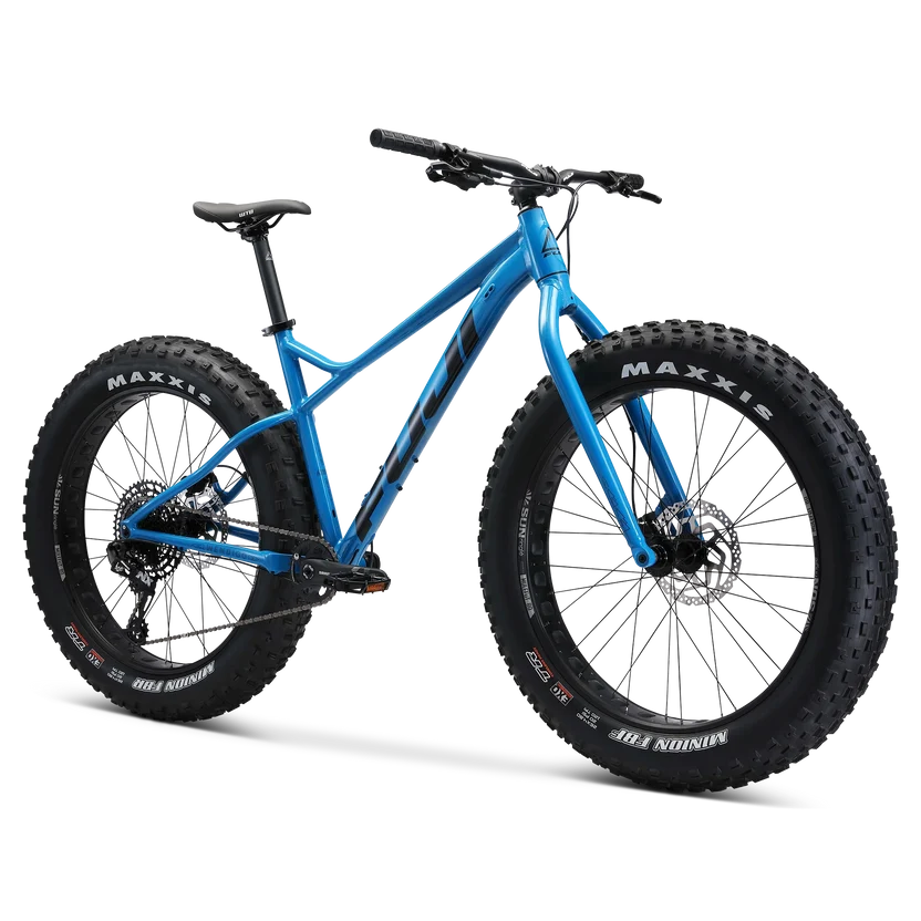 Fuji Wendigo 1.1 blue fat bike – A bright blue Fuji Wendigo fat bike with oversized Maxxis tires, a black saddle, and disc brakes, shown in a three-quarters profile against white.