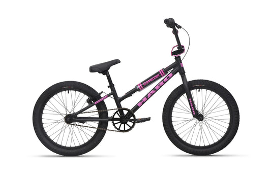 Black and pink kids BMX bike – A matte black kids BMX bike with bright pink Haro graphics, padded top tube and handlebar guards, black tires, and a step-through frame against white.