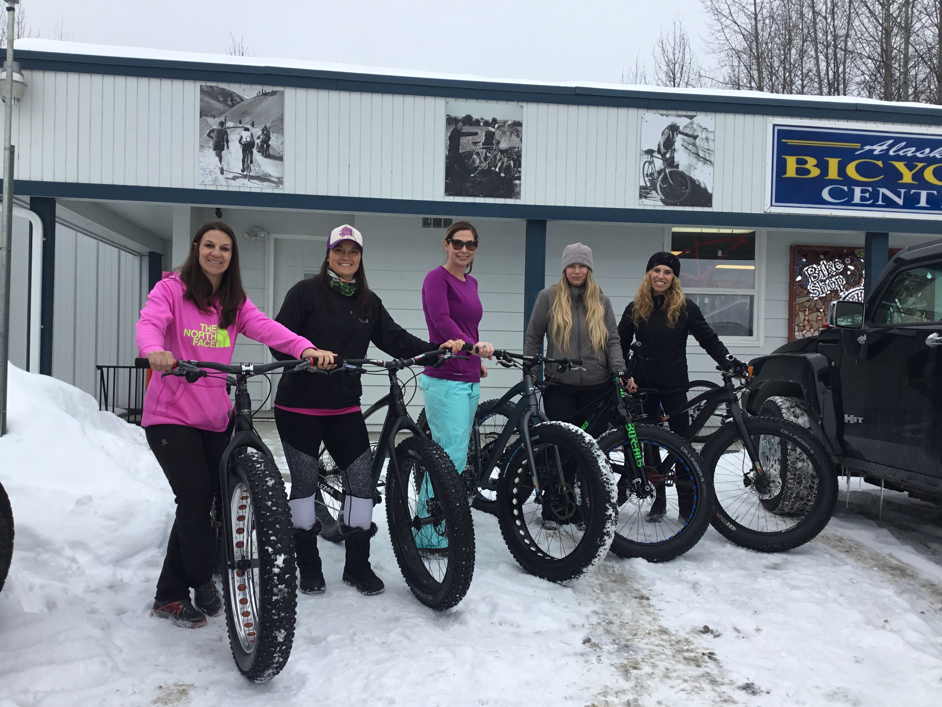 A photo of people renting fat tire bicycles from Alaska Bicycle Center.
