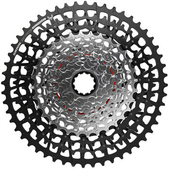 SRAM GX Eagle 12-speed bike cassette – Centred front view of a twelve-speed bicycle cassette showing polished silver inner cogs transitioning to wide black outer cogs against a clean white background.