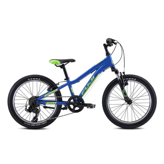 The Fuji Dynamite 20 is the perfect first mountain bike for young riders ready to explore neighborhood trails, parks, and dirt paths. Built with a lightweight aluminum frame, front suspension fork, and a simple 1x6 Shimano drivetrain, it delivers confidence, comfort, and reliable performance as kids develop their riding skills.