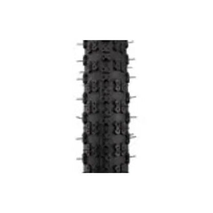 Kenda K50 black knobby bike tire tread – A close-up view shows the textured black rubber knobby tread pattern of a Kenda bike tire against a plain white background.