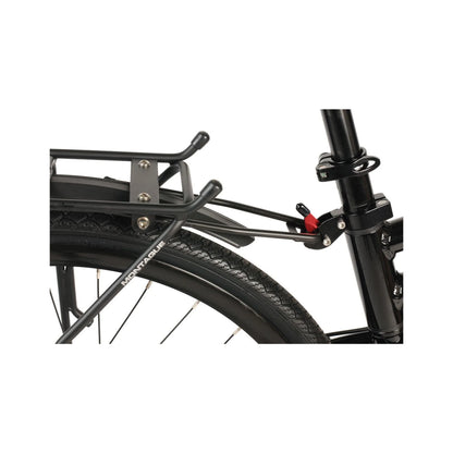 Montague folding bike rear cargo rack – Close-up of a matte black Montague rear cargo rack and fender mounted above the back tire, clamped to the seatpost with a red quick-release lever.