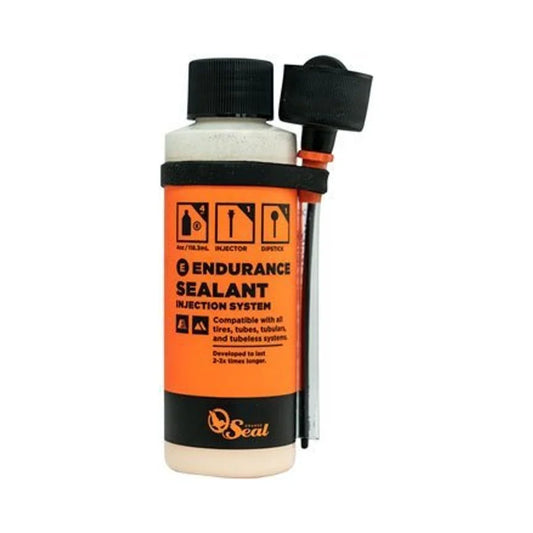 Orange Seal Endurance Tubeless Tire Sealant with Twist Lock Applicator - 4oz (Tubeless Sealant) – studio product photo