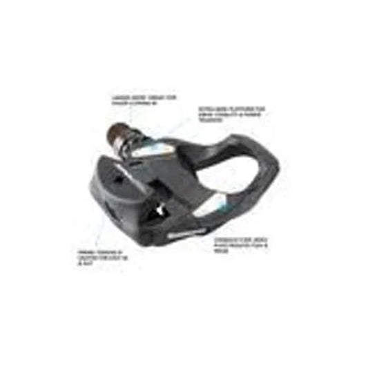 Shimano PD-RS500 SPD-SL road pedal – Black clipless bicycle pedal shown against a plain white background, featuring silver metallic contact plates and surrounding callout text pointing to its design features.