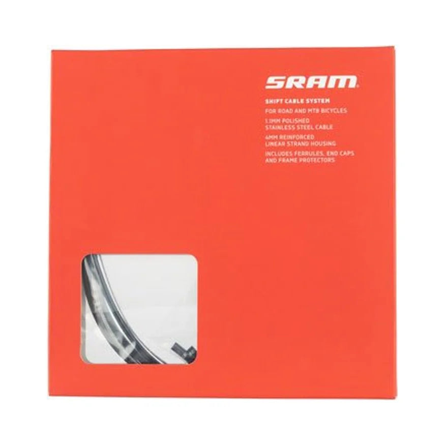 SRAM shift cable and housing kit box – Bright red square packaging for a SRAM shift cable system features a clear cutout window in the lower left revealing the coiled black cable housing.
